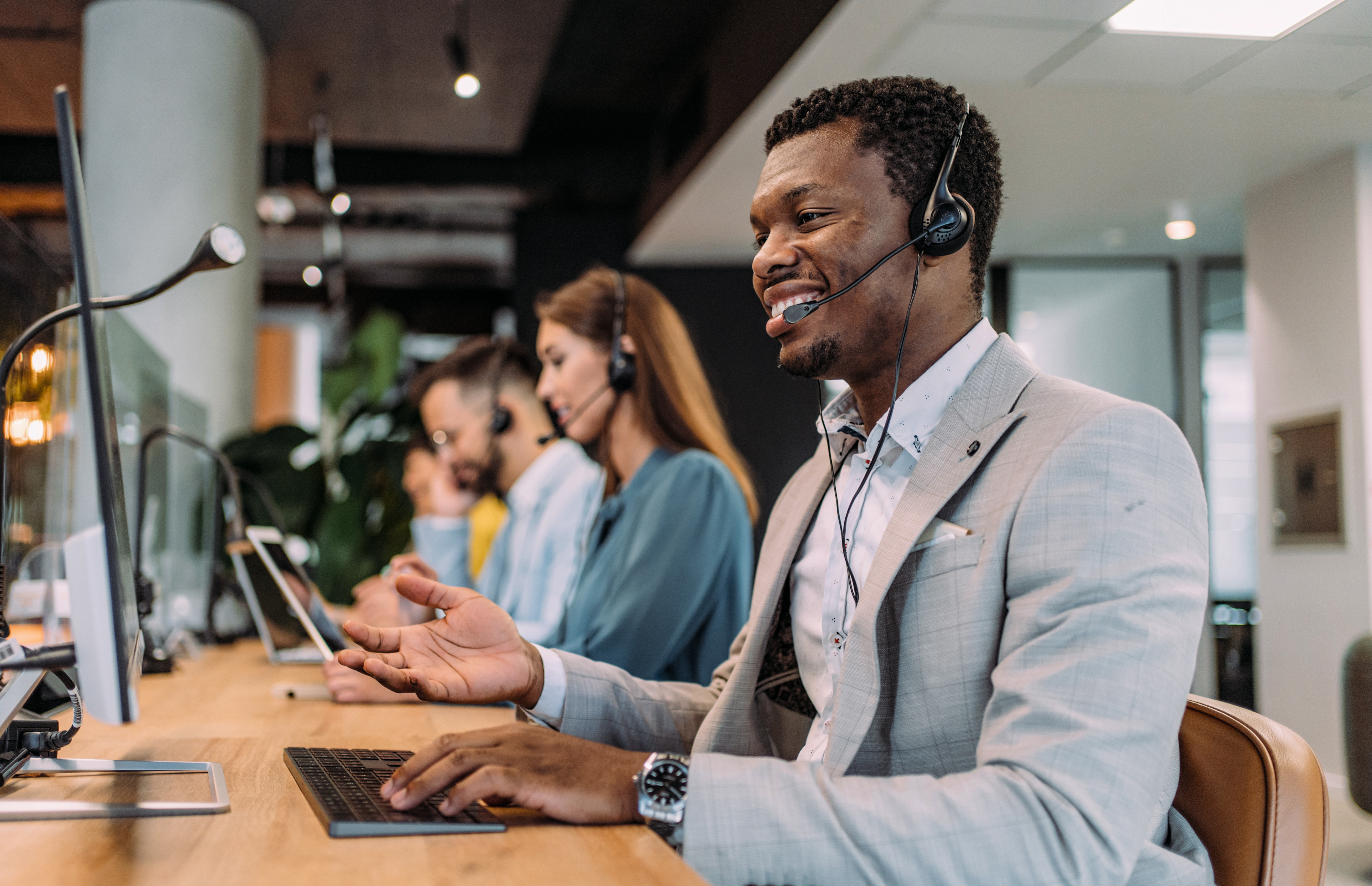 A call center agent assisting a patient on a call.