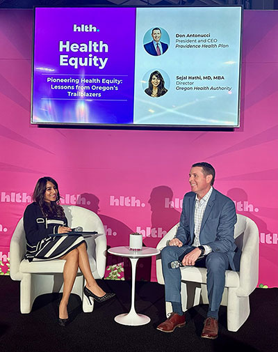 PHP President and CEO Don Antonucci and OHA Director, Dr. Sejal Hathi on stage speaking at HLTH.